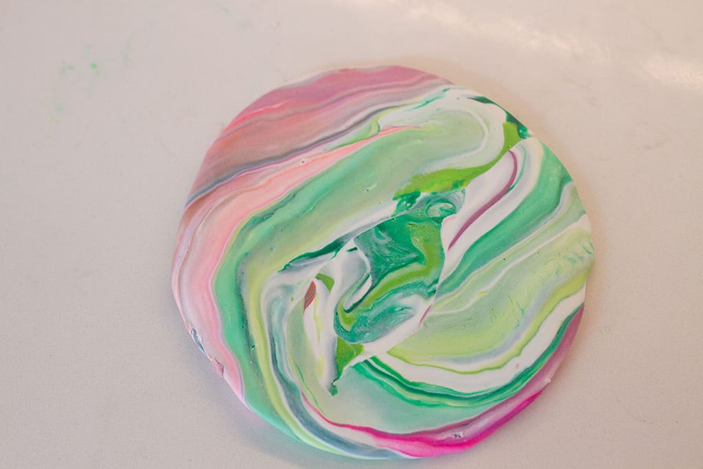 Learn how easy it is to make your own DIY marbled clay dishes with this tutorial from Oh So Lovely Blog!