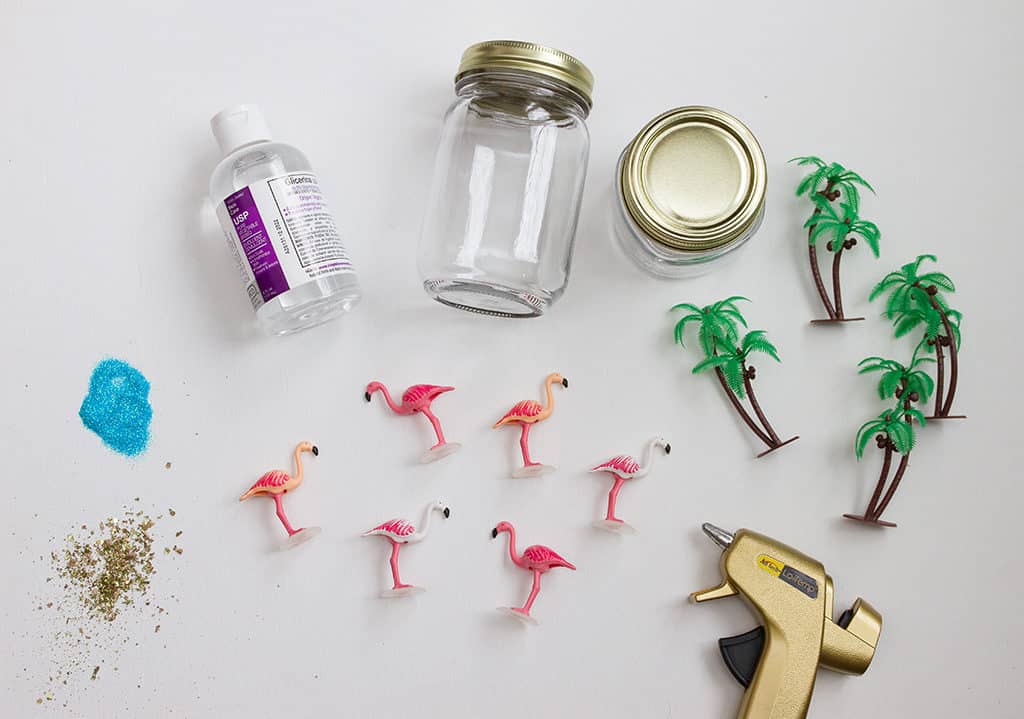 Oh So Lovely Blog shares an easy and fun craft project perfect fo spring and summer...DIY flamingo snow globes!