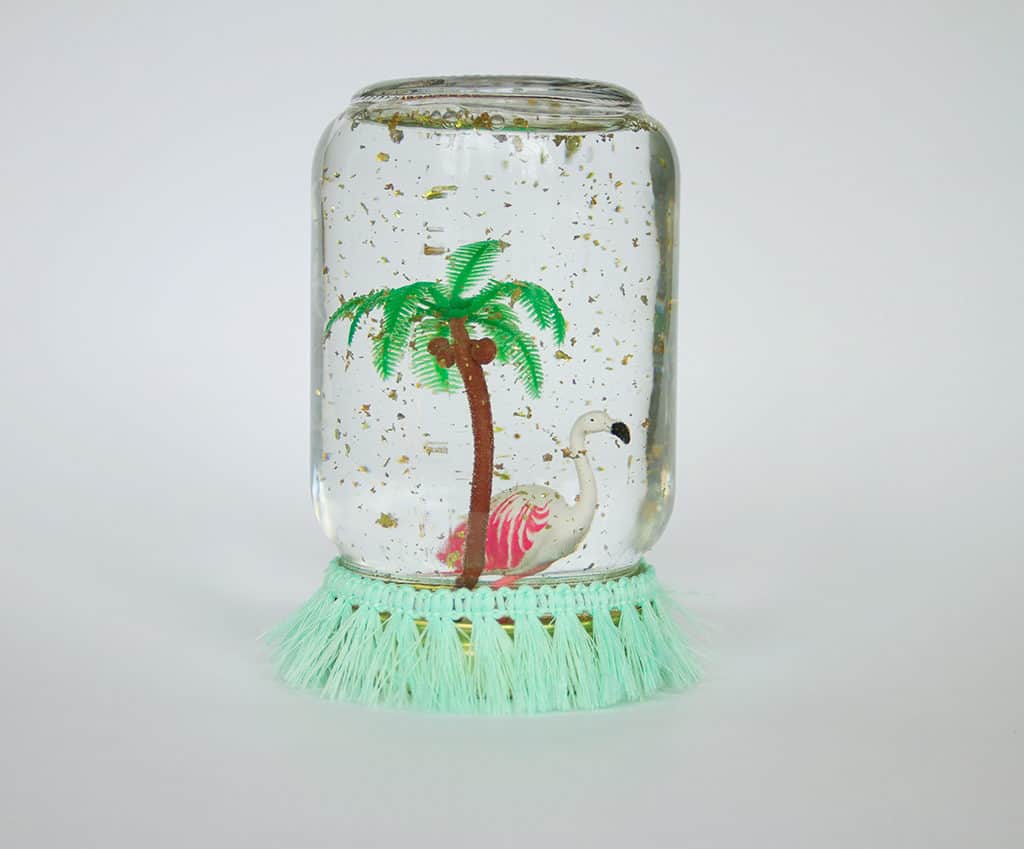 Oh So Lovely Blog shares an easy and fun craft project perfect for spring and summer...DIY flamingo snow globes! They make great gifts or party decor.