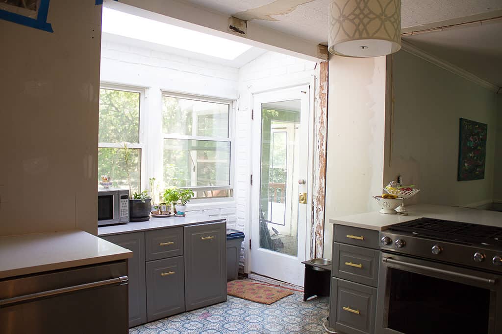 Audrey of Oh So Lovely blog shares the 2+ year journey of a DIY kitchen remodel on a budget. Check out the before, during and after photos!