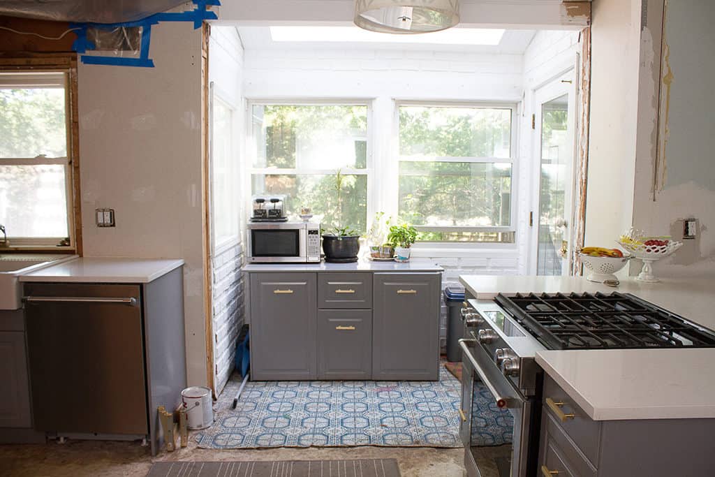 Audrey of Oh So Lovely blog shares the 2+ year journey of a DIY kitchen remodel on a budget. Check out the before, during and after photos!