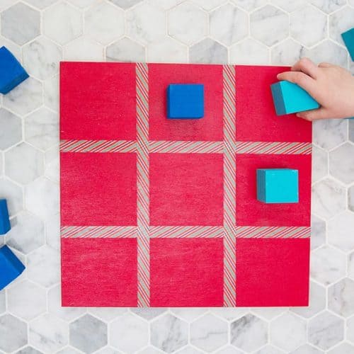 Audrey of Oh So Lovely Blog shares a DIY tic tac toe board tutorial that is super easy and fun to make—perfect for gift giving!