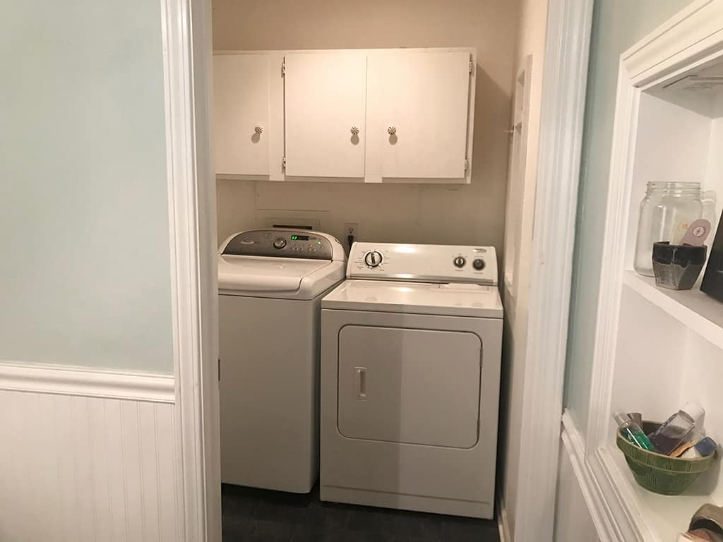 DIY laundry room update featuring Tic Tac Tiles and IKEA accessories