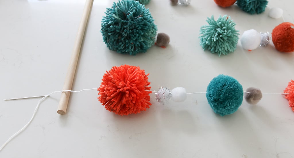 DIY pom pom wall hanging