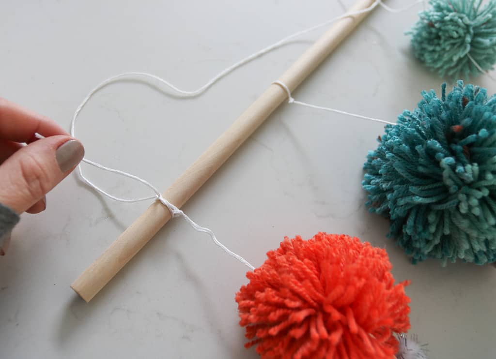 DIY pom pom wall hanging