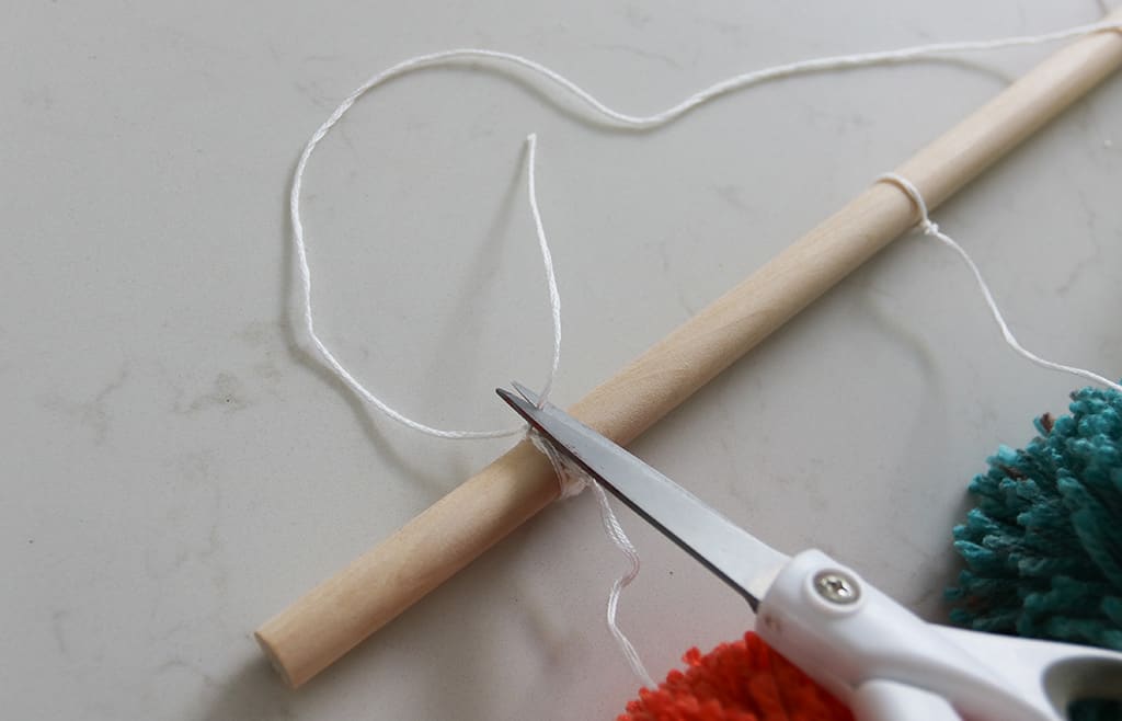 DIY pom pom wall hanging