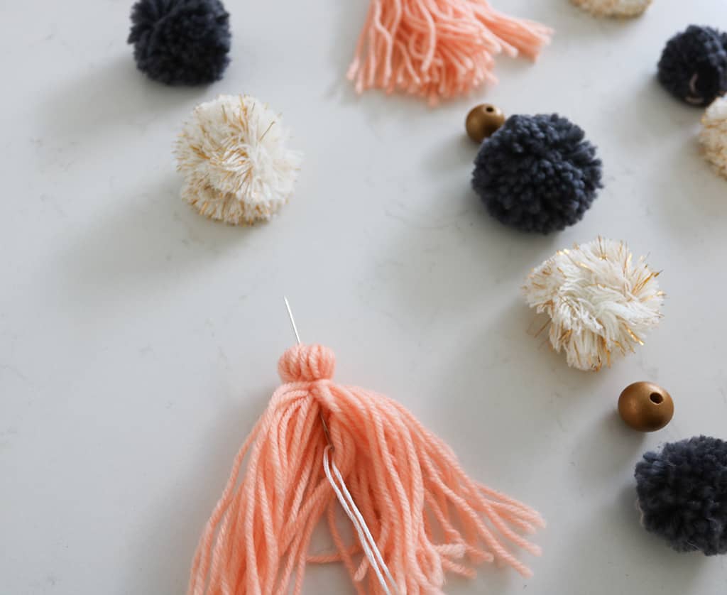 DIY pom pom wall hanging