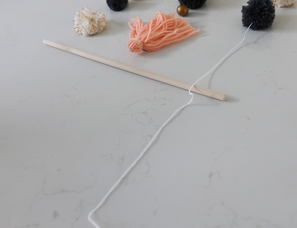 DIY pom pom wall hanging