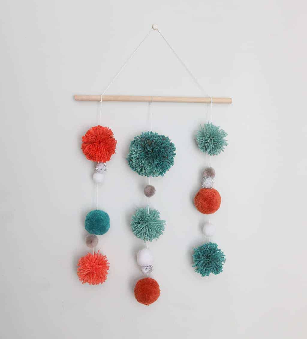 DIY Holiday Pom Pom Door Hanger