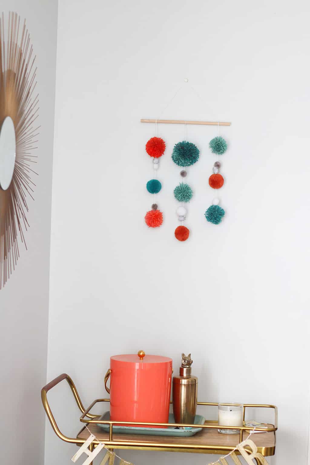 DIY pom pom wall hanging