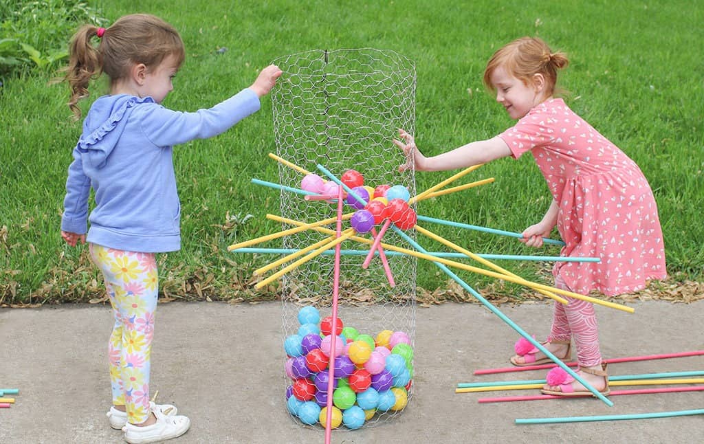 Audrey Kuether of Oh So Lovely shares a life size DIY Kerplunk yard game tutorial—perfect for outdoor entertaining!