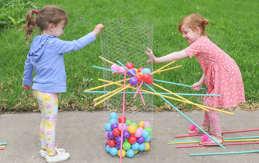 Audrey Kuether of Oh So Lovely shares a life size DIY Kerplunk yard game tutorial—perfect for outdoor entertaining!