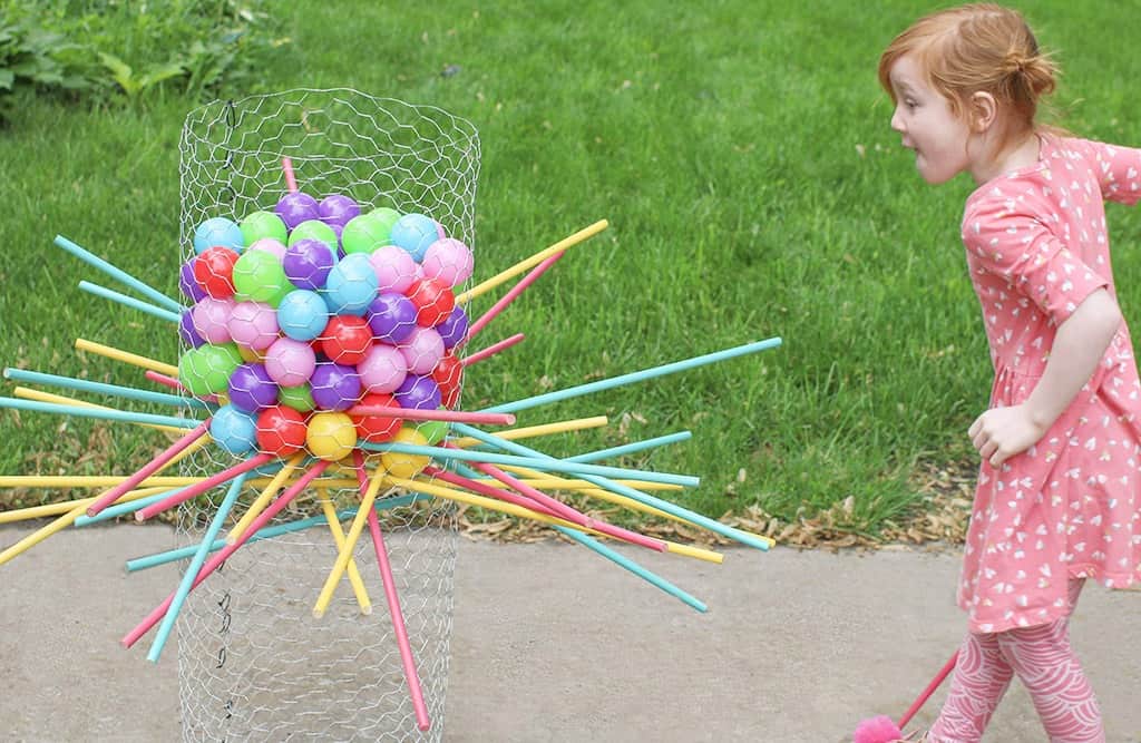 Audrey Kuether of Oh So Lovely shares a life size DIY Kerplunk yard game tutorial—perfect for outdoor entertaining!