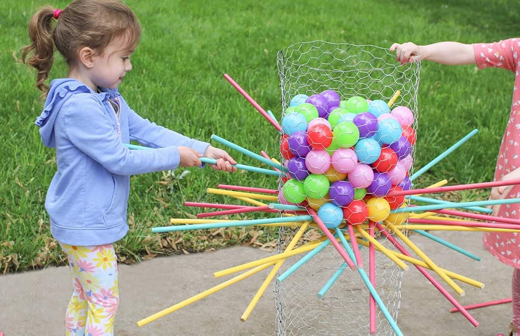 Audrey Kuether of Oh So Lovely shares a life size DIY Kerplunk yard game tutorial—perfect for outdoor entertaining!