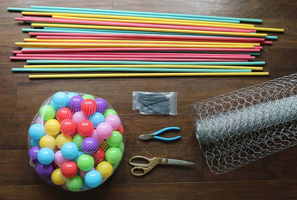 Audrey Kuether of Oh So Lovely shares a life size DIY Kerplunk yard game tutorial—perfect for outdoor entertaining!