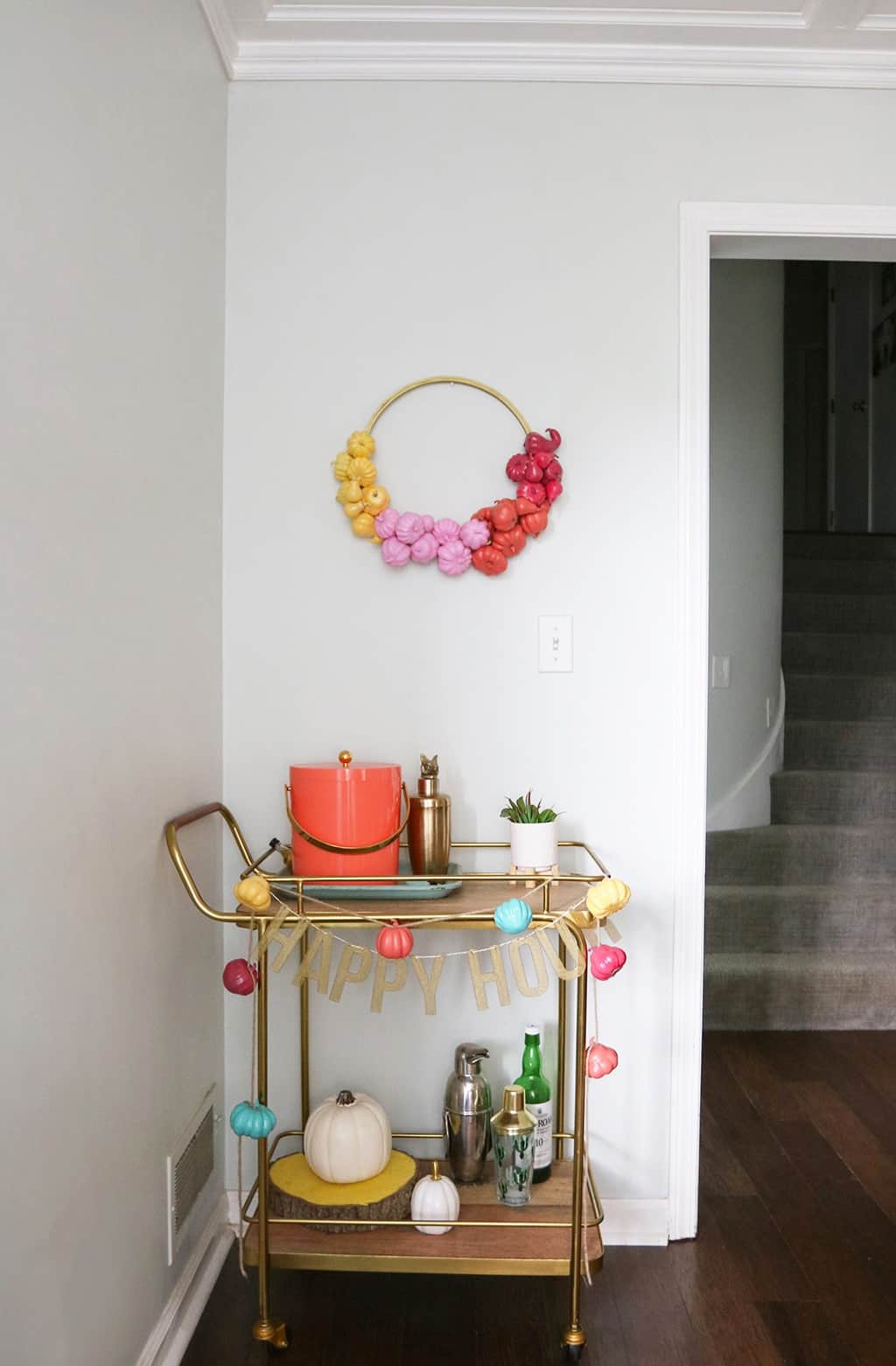 DIY pumpkin wreath and banner — I highly recommend them as a fun and affordable way to add some color and personality to your fall decor!