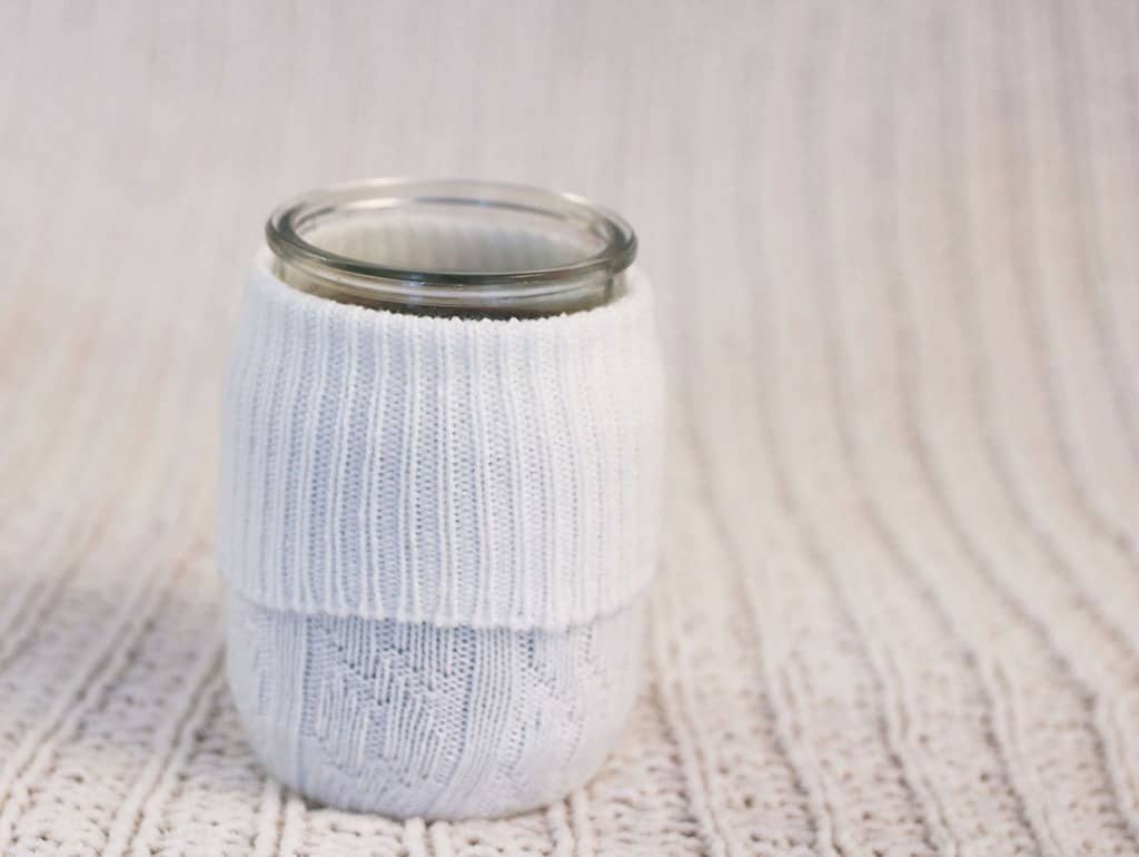 DIY candle sweaters made from socks