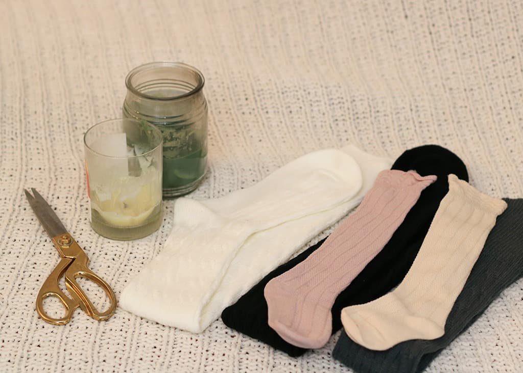 DIY candle sweaters made from socks