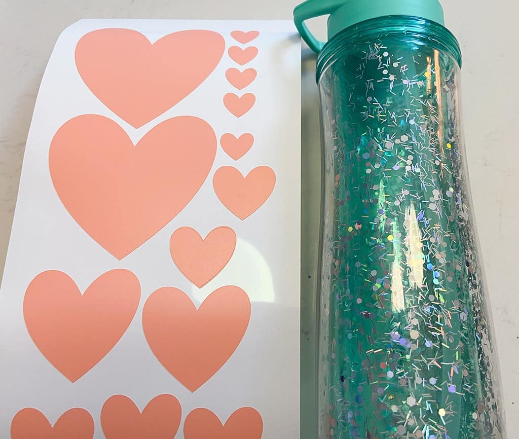 Heart vinyl cricut coral hearts on water bottle