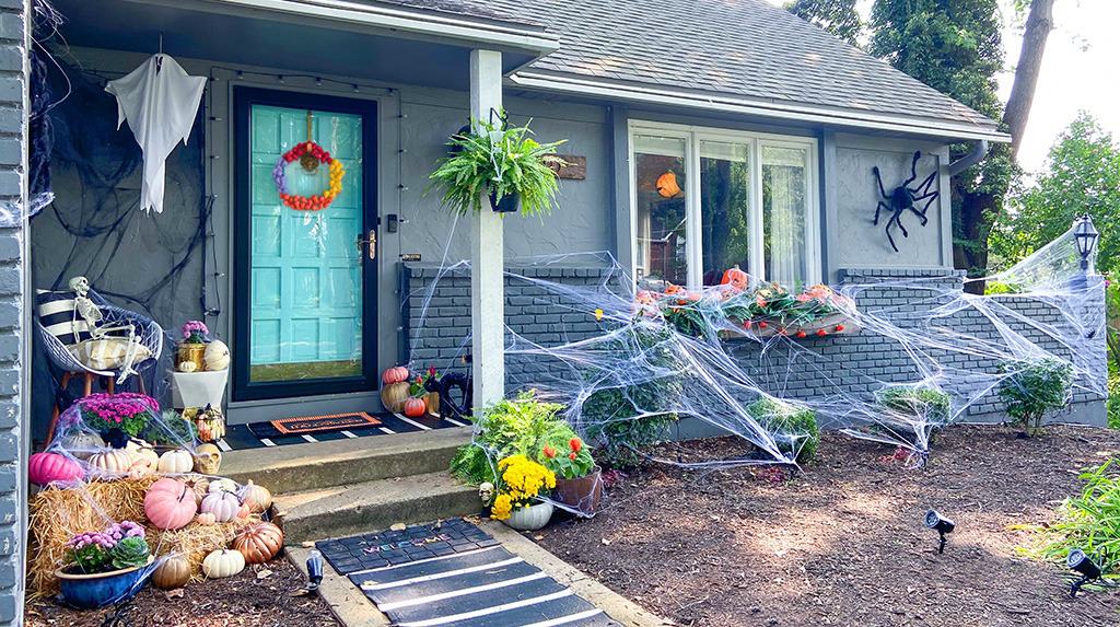 Learn how to make a DIY colorful and modern skull Halloween wreath that will look amazing on your front door this fall. So festive!