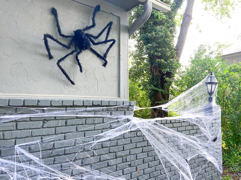 giant outdoor halloween spider and spider webs