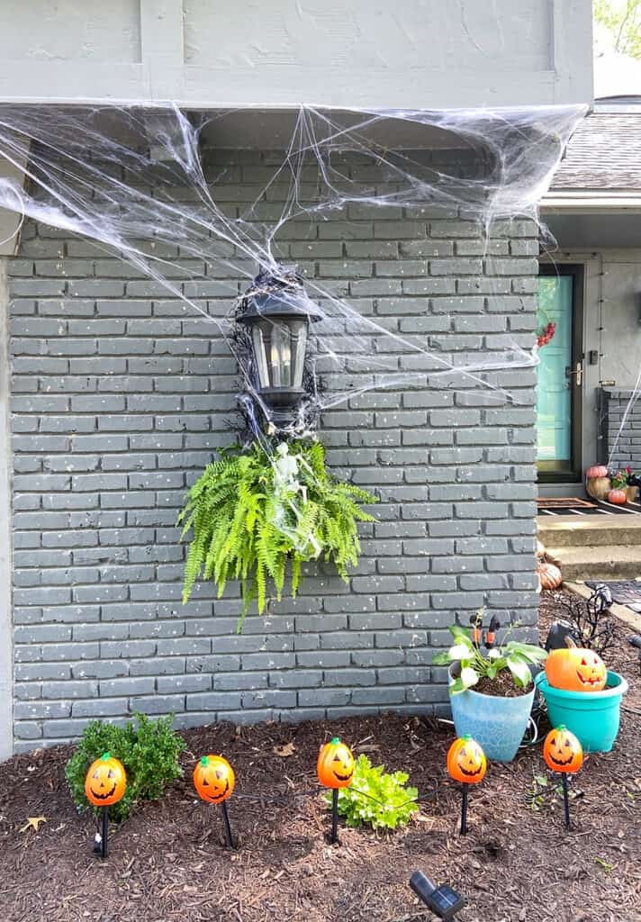 outdoor halloween decorations - spiderwebs, light up pumpkins