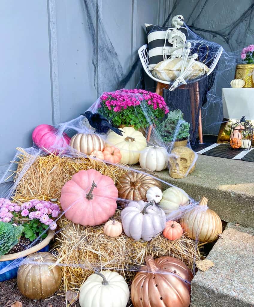 Faux pumpkins and spider webs! A fun & unique outdoor Halloween decor tour – at both day and nighttime! 