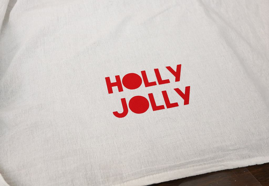 Holly Jolly kitchen tea towel