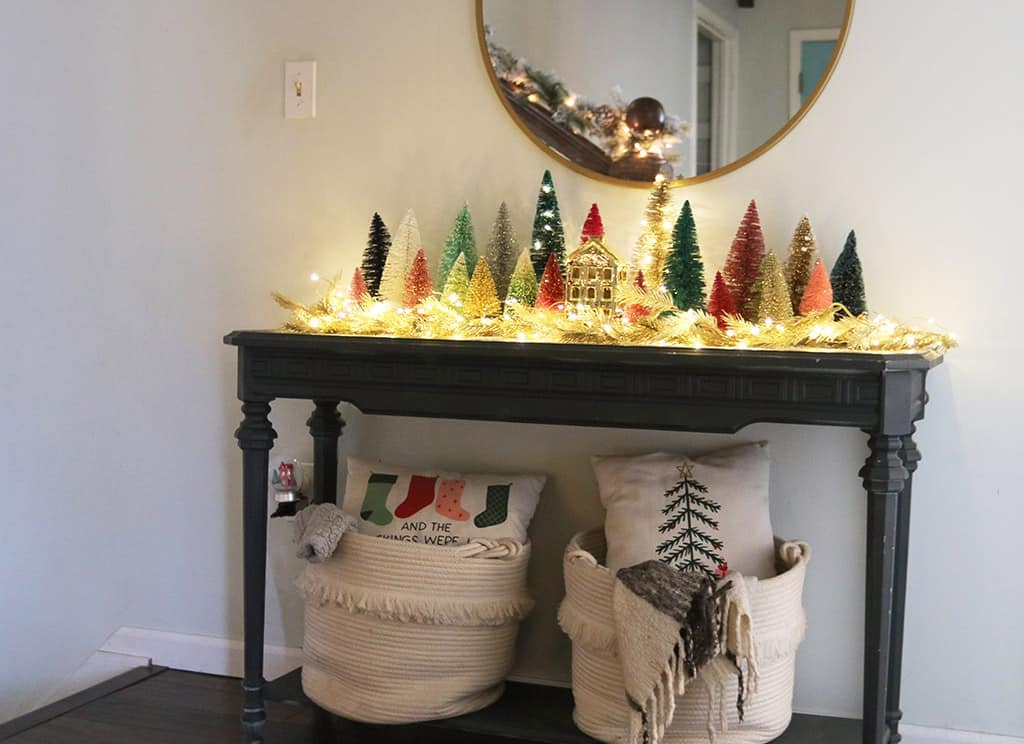 A modern and colorful holiday home tour full of affordable festivity and touches of fun throughout! Entryway