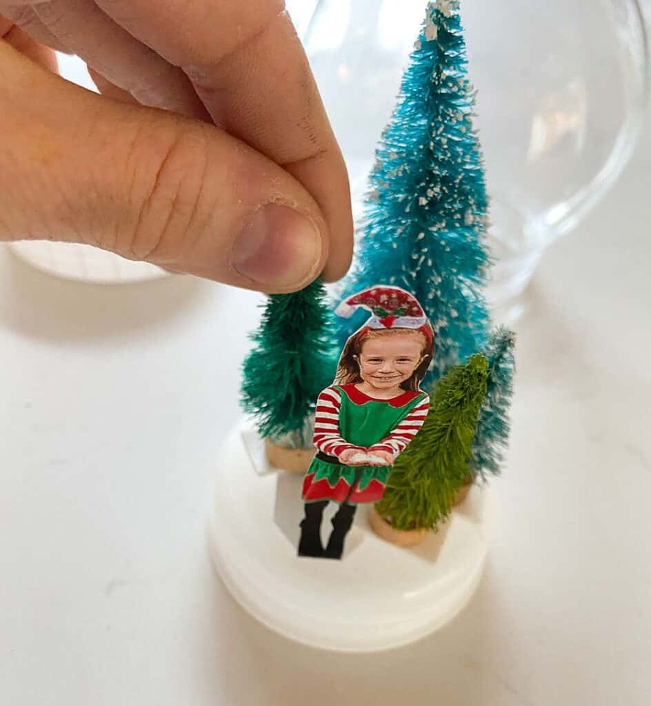 Tape your bottle brush trees and photo to base