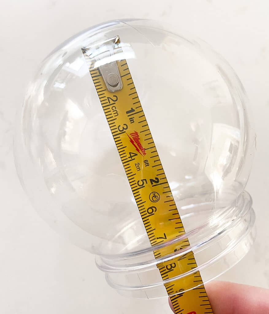 Measure how tall photo should be inside snow globe