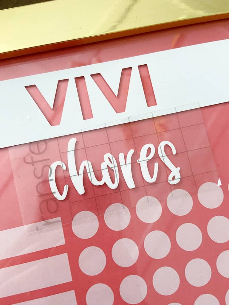 Use Cricut vinyl to personalized your DIY upcycled chore chart