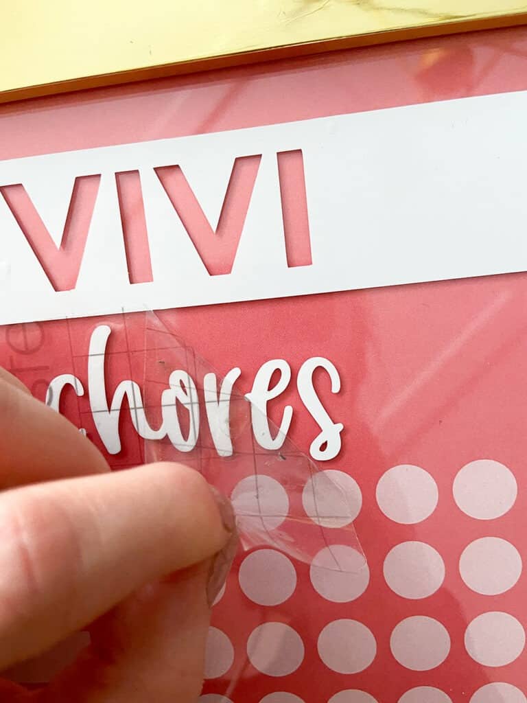 Use Cricut vinyl to personalized your DIY upcycled chore chart