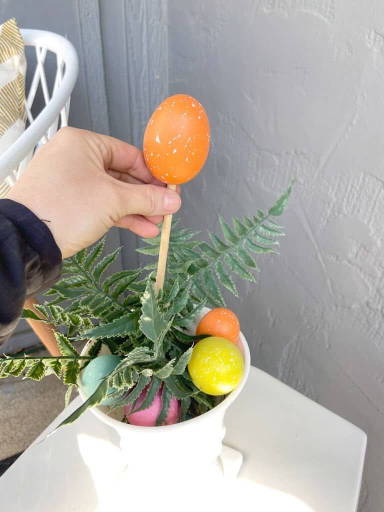 Easter decor ideas for your front porch and window boxes. Get the festive, cute, and colorful look quickly and affordably!