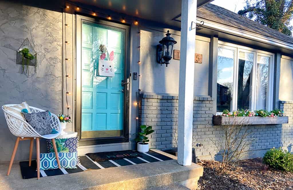 Easter decor ideas for your front porch and window boxes. Get the festive, cute, and colorful look quickly and affordably!