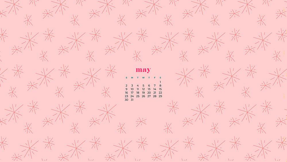 sunburst pattern on pink background 