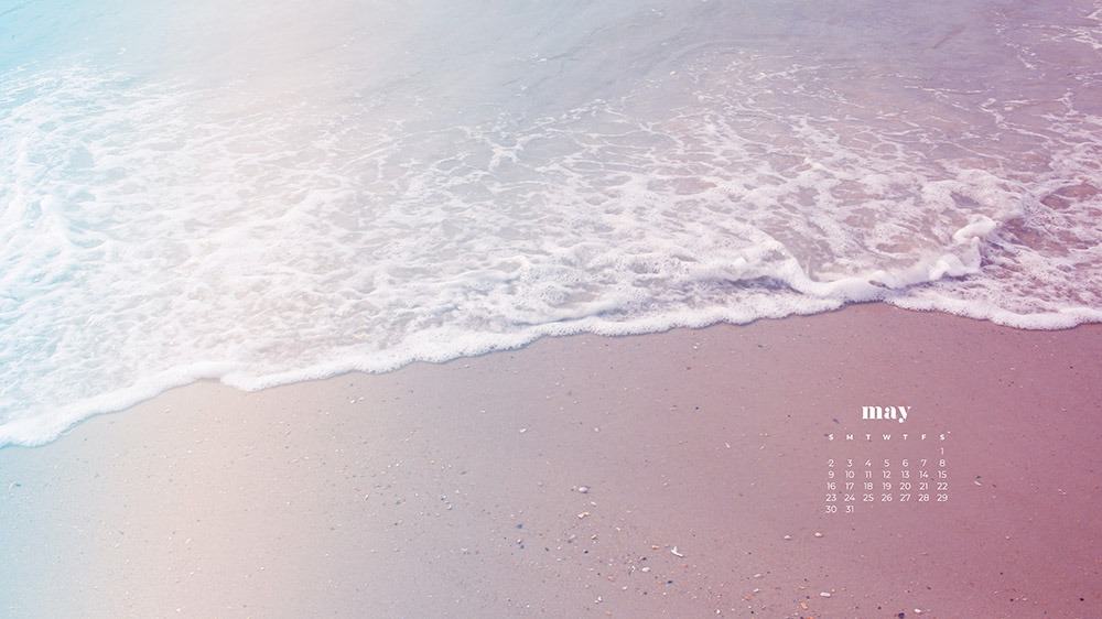 sand and beach wave at the ocean in pretty cotton candy colors