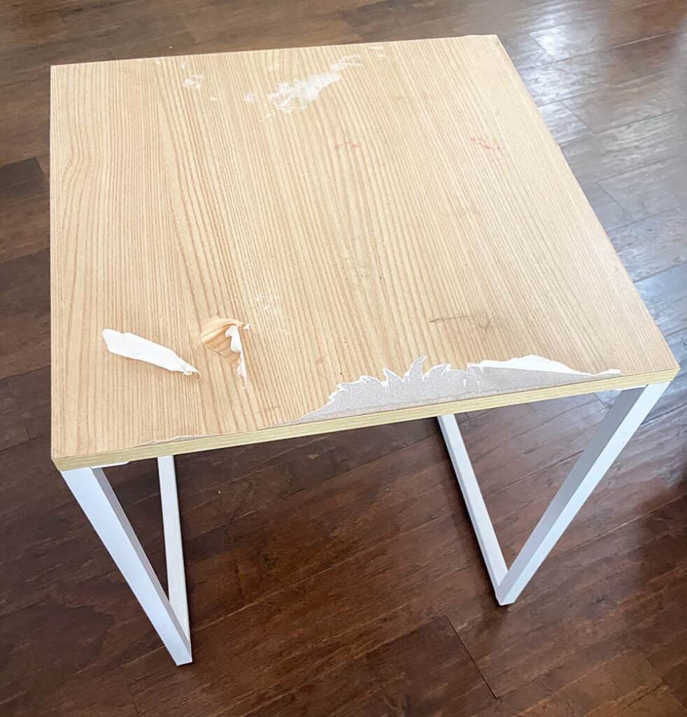 worn out and damaged table top before
