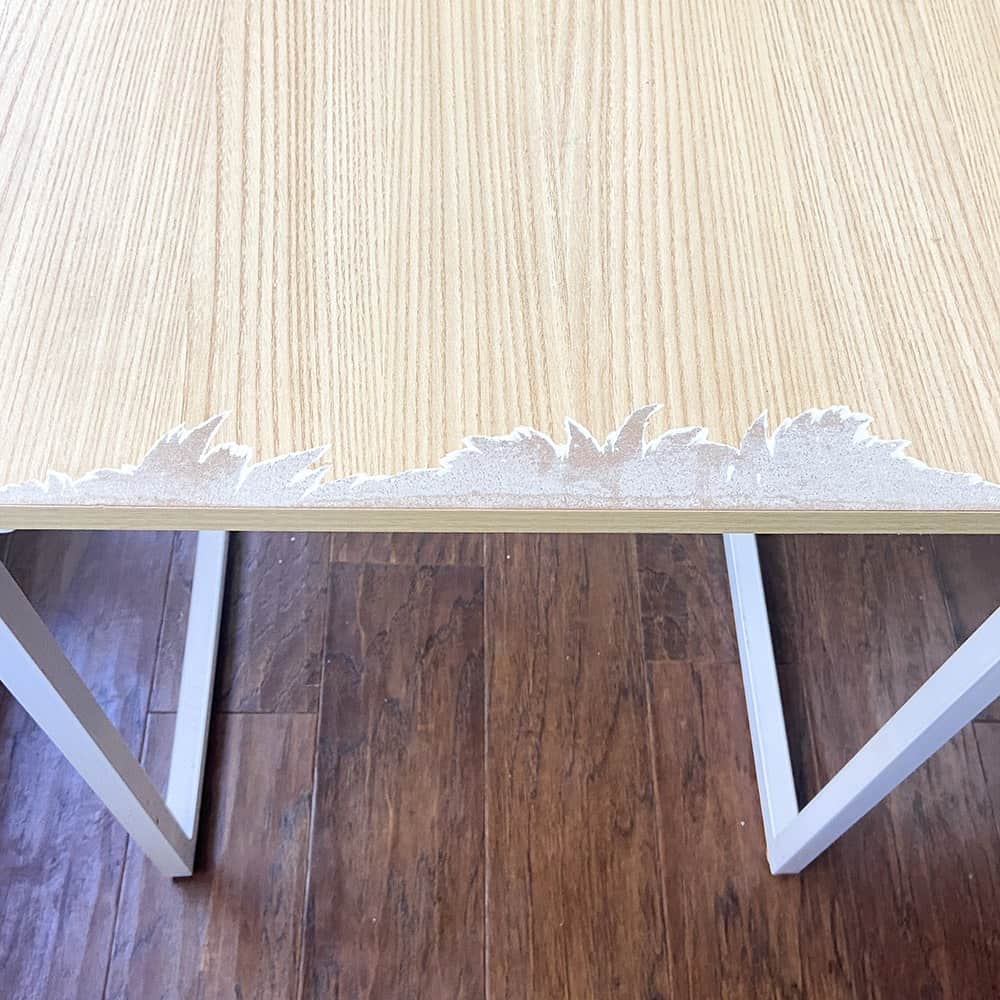 worn out and  damaged table top before