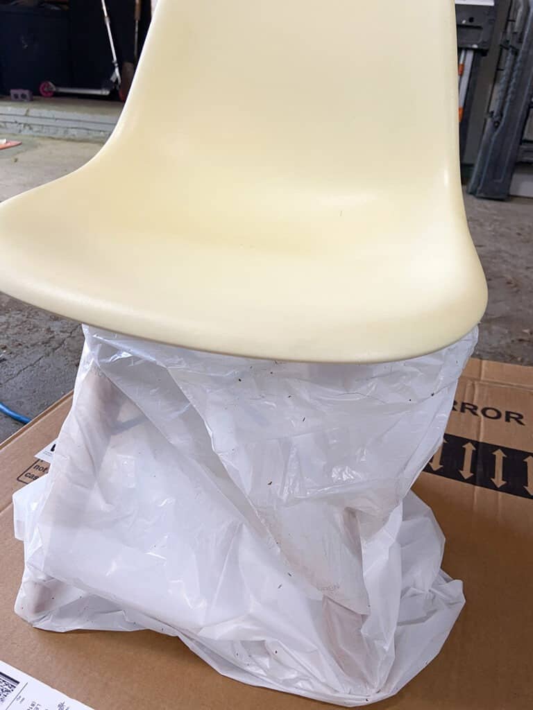 spray paint a yellowed modern kid chair white