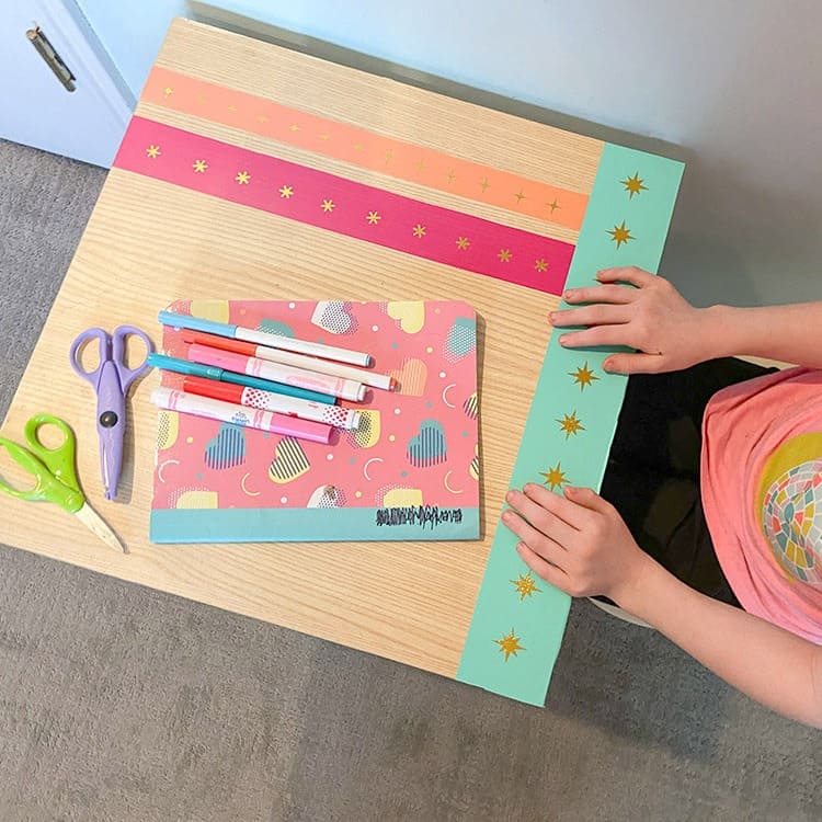 A table top design refresh adds new life to a kid desk in just 10 minutes!