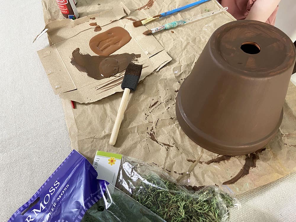 painting terra cotta pots brown to mimic tree look for gnome garden