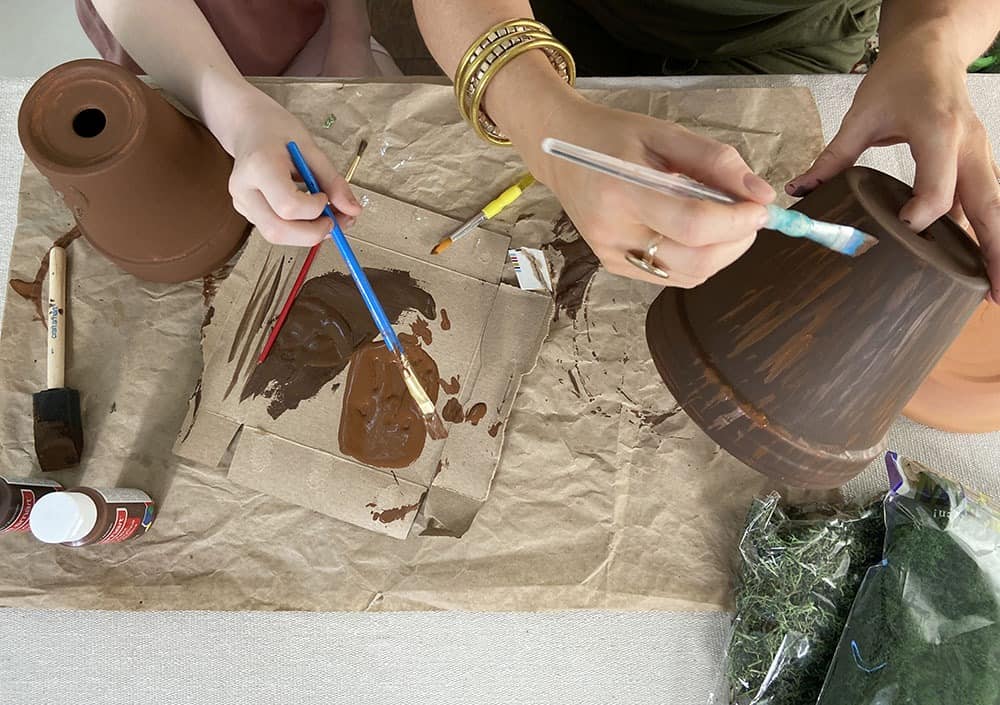 painting terra cotta pots brown to mimic tree look for gnome garden