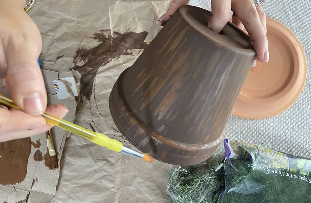 painting terra cotta pots brown to mimic tree look for gnome garden