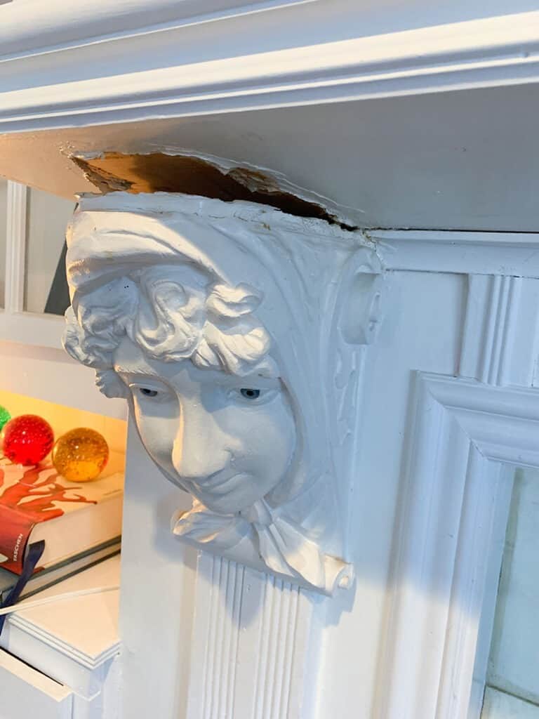 removing creepy corbels from a fireplace A step-by-step DIY fireplace makeover tutorial – See how it went from extra creepy to clean and classic on a very small budget! 