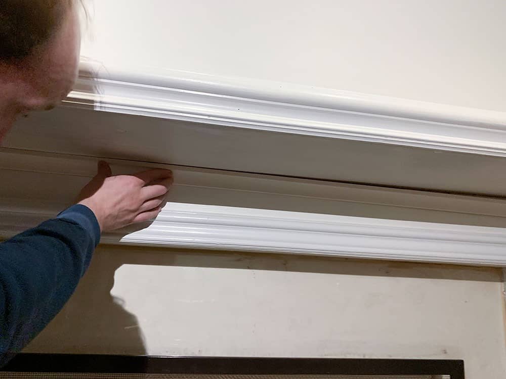 re-attaching the fireplace mantle fireplace makeover