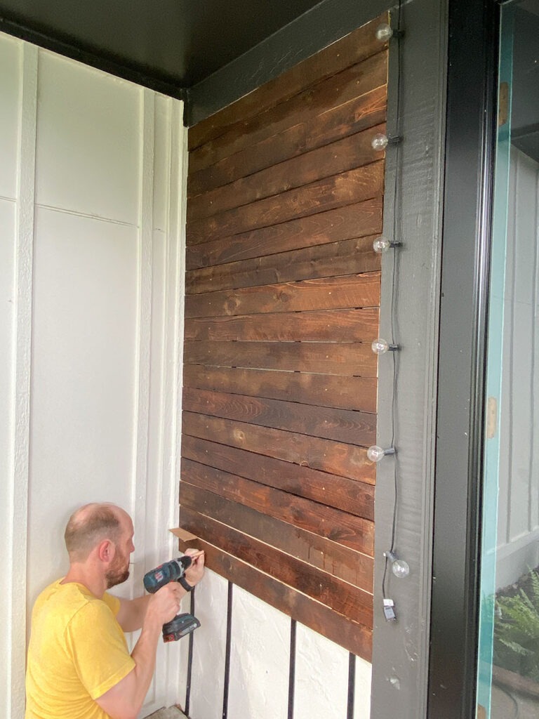 adding modern wood slat wall to porch