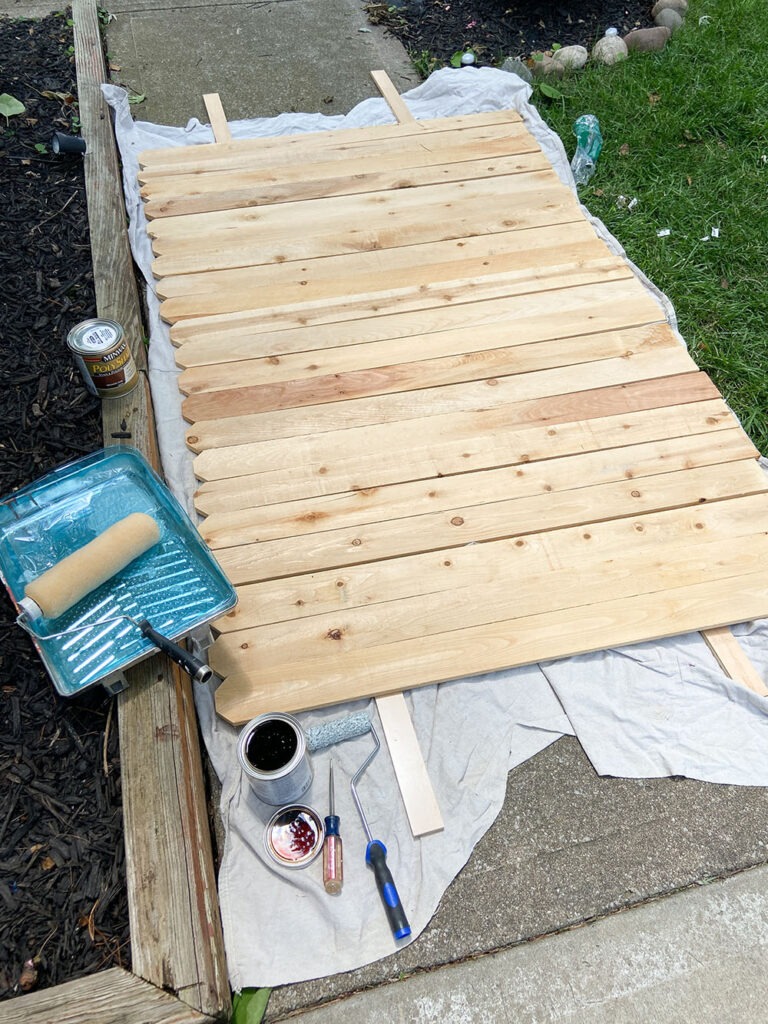 Staining wood fence picket boards