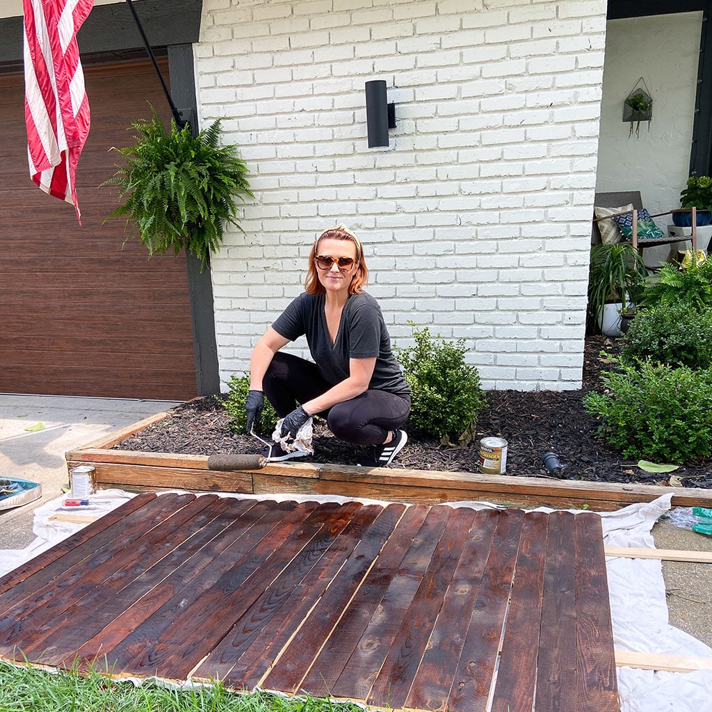 Staining wood fence picket boards