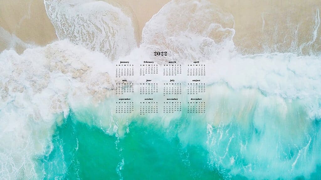 ocean and sand arial view with 2022 full-year calendar for your desktop